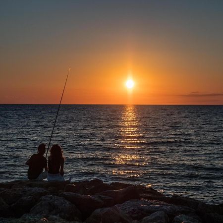 Gitavillage Argentario Albinia Kültér fotó Sunset at the Black Sea