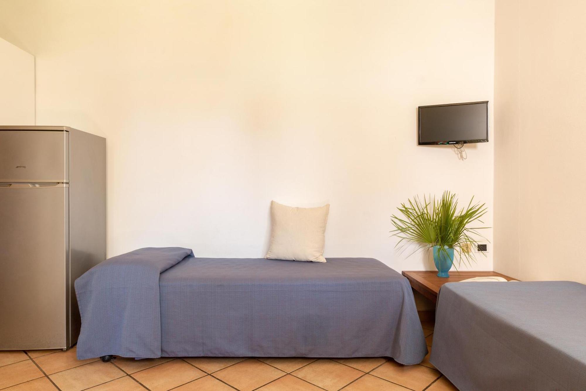 Gitavillage Argentario Albinia Kültér fotó A typical room at the hostel